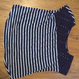 A blue and white striped shirt with a lace pattern